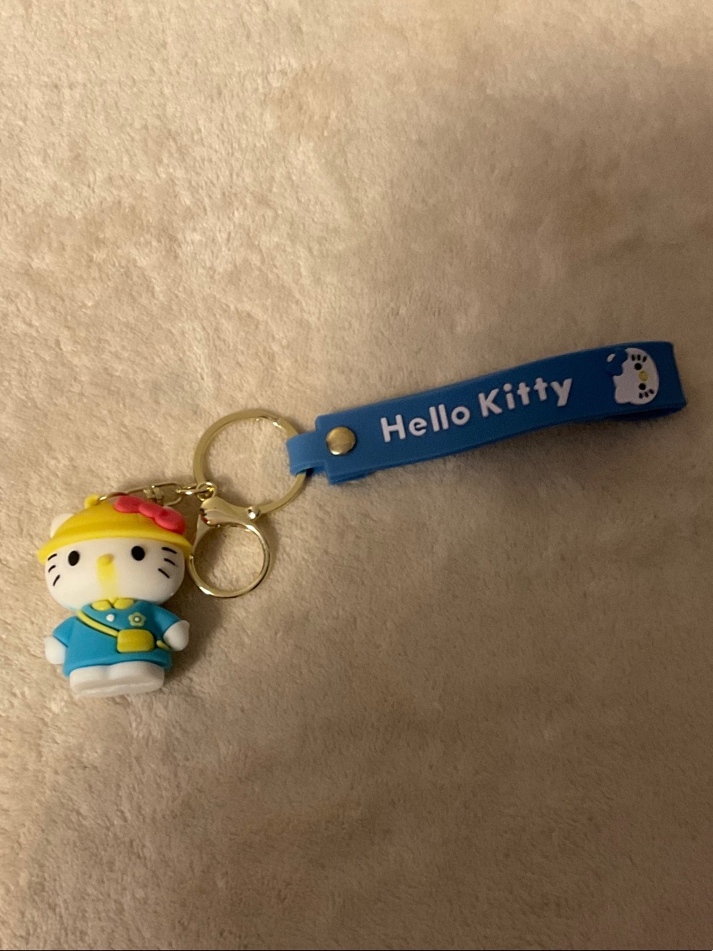 Hello Kitty Blue Keychain with Yellow Hat and Pink Bow